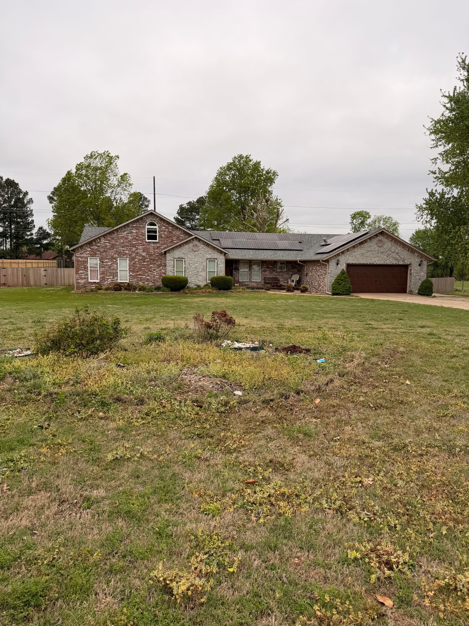 Front Yard Landscape Beds Removed and Rebuilt with White Gravel image