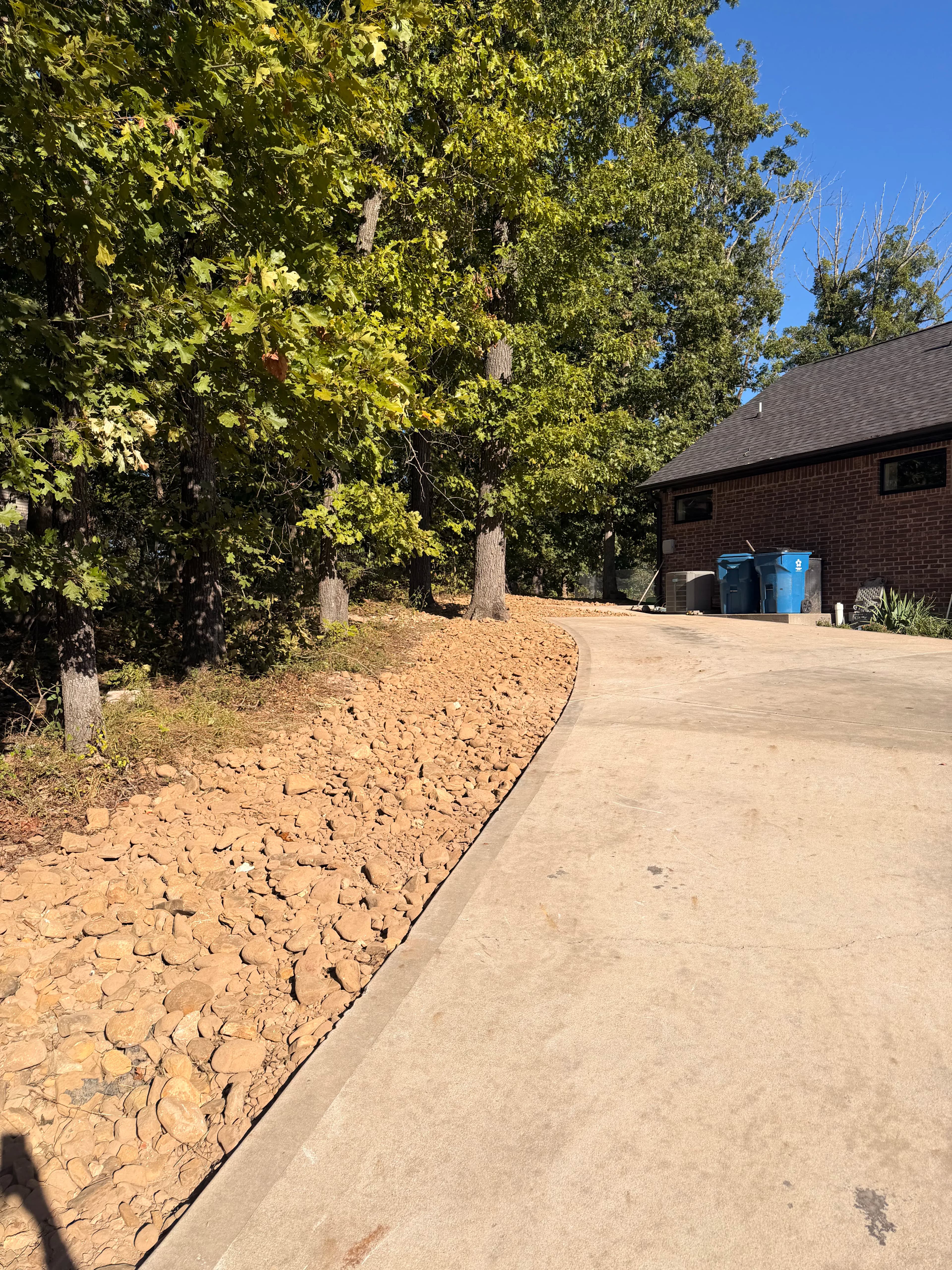 Project Weed Barrier and Chocolate Rock Give This Side Yard a Clean Edge image
