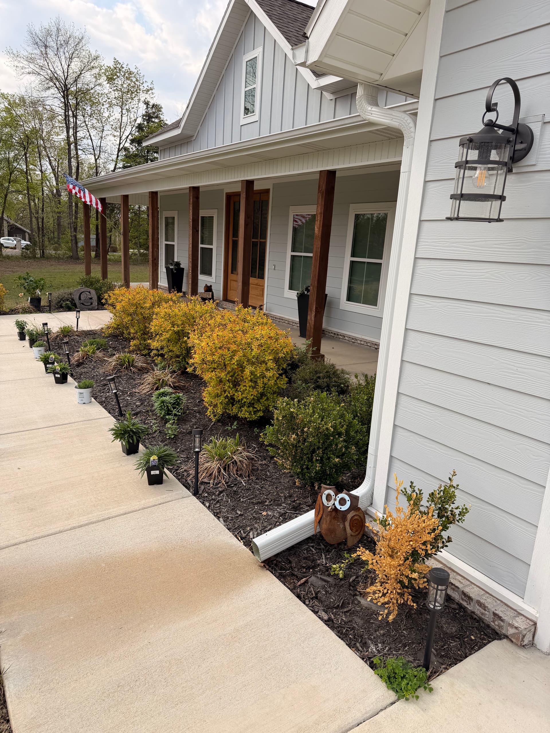 Gallery photos for Chocolate Rock and Fresh Plants Give This Home Serious Curb Appeal: Image #1