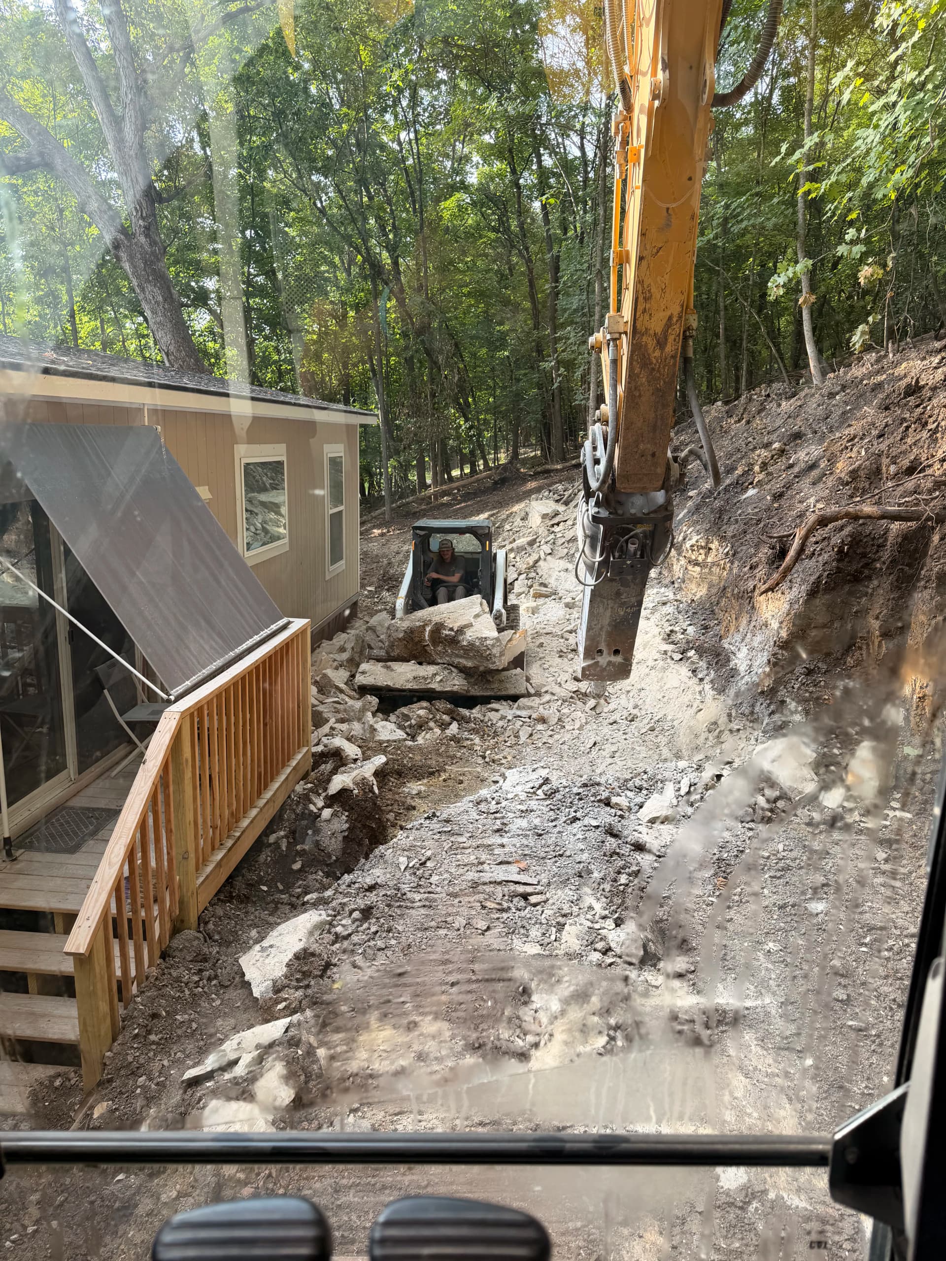 Gallery photos for From Mudslide Risk to Solid Retaining Wall in NWA: Image #4