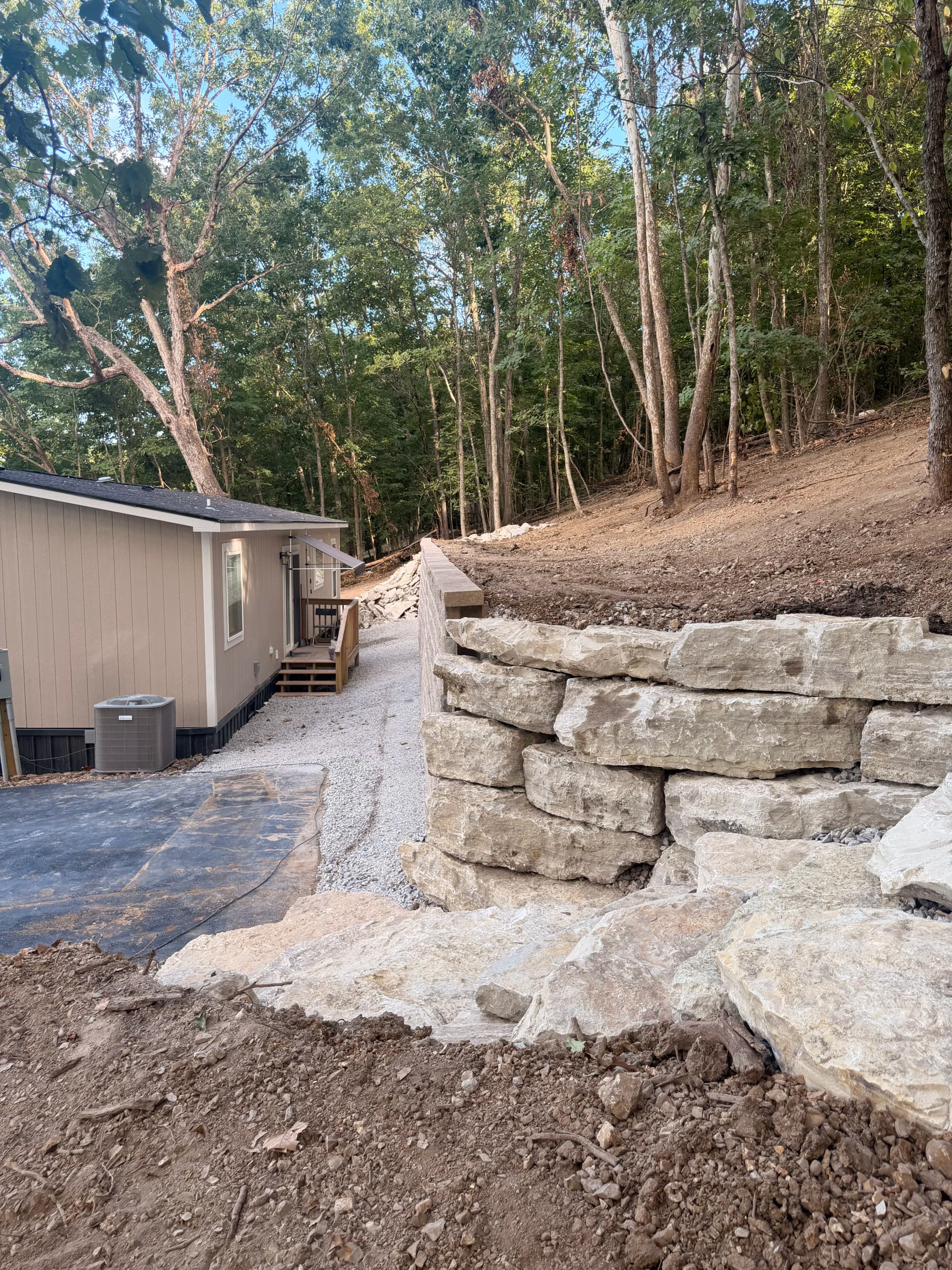 Gallery photos for From Mudslide Risk to Solid Retaining Wall in NWA: Image #7
