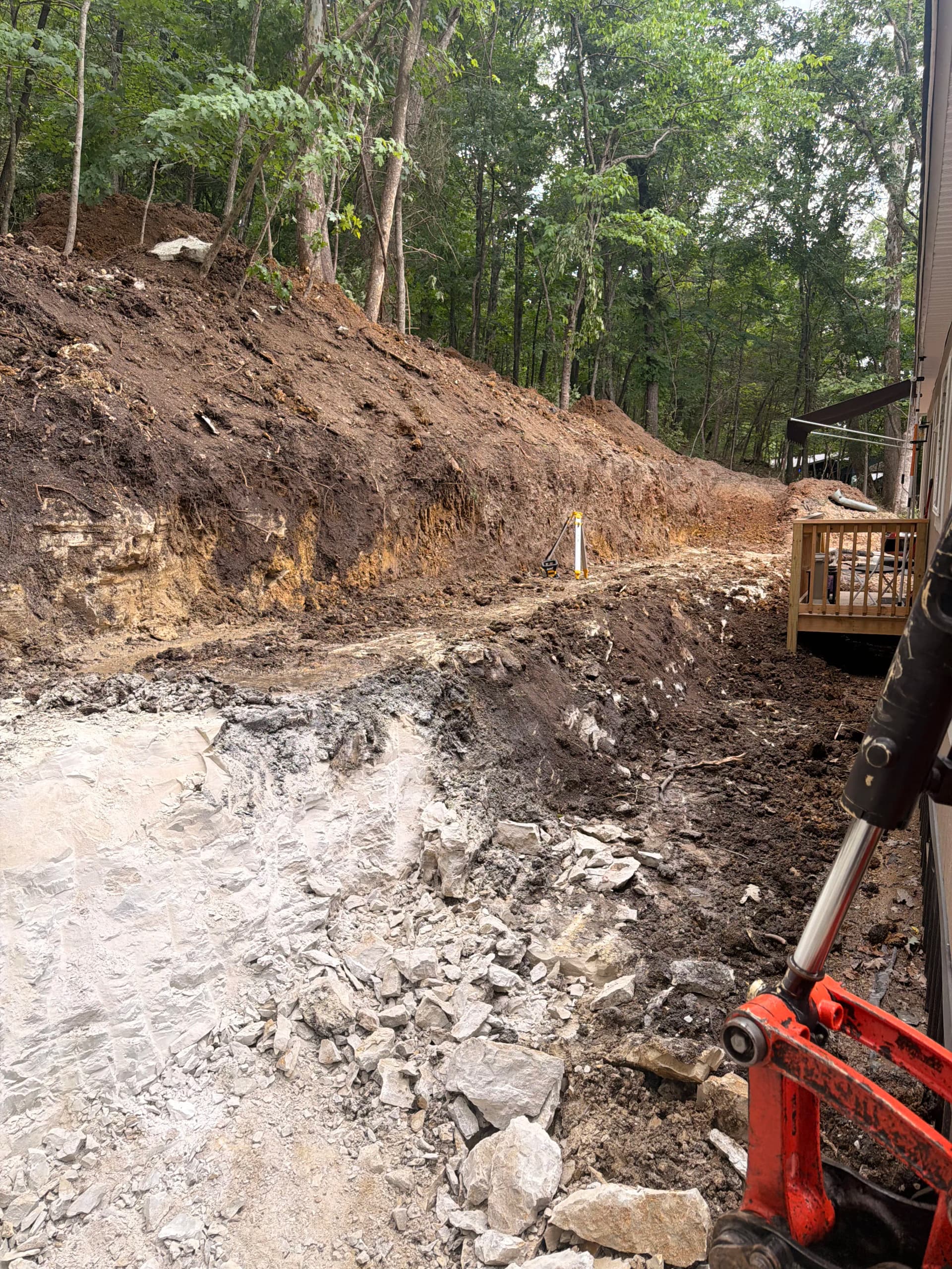 Gallery photos for From Mudslide Risk to Solid Retaining Wall in NWA: Image #2