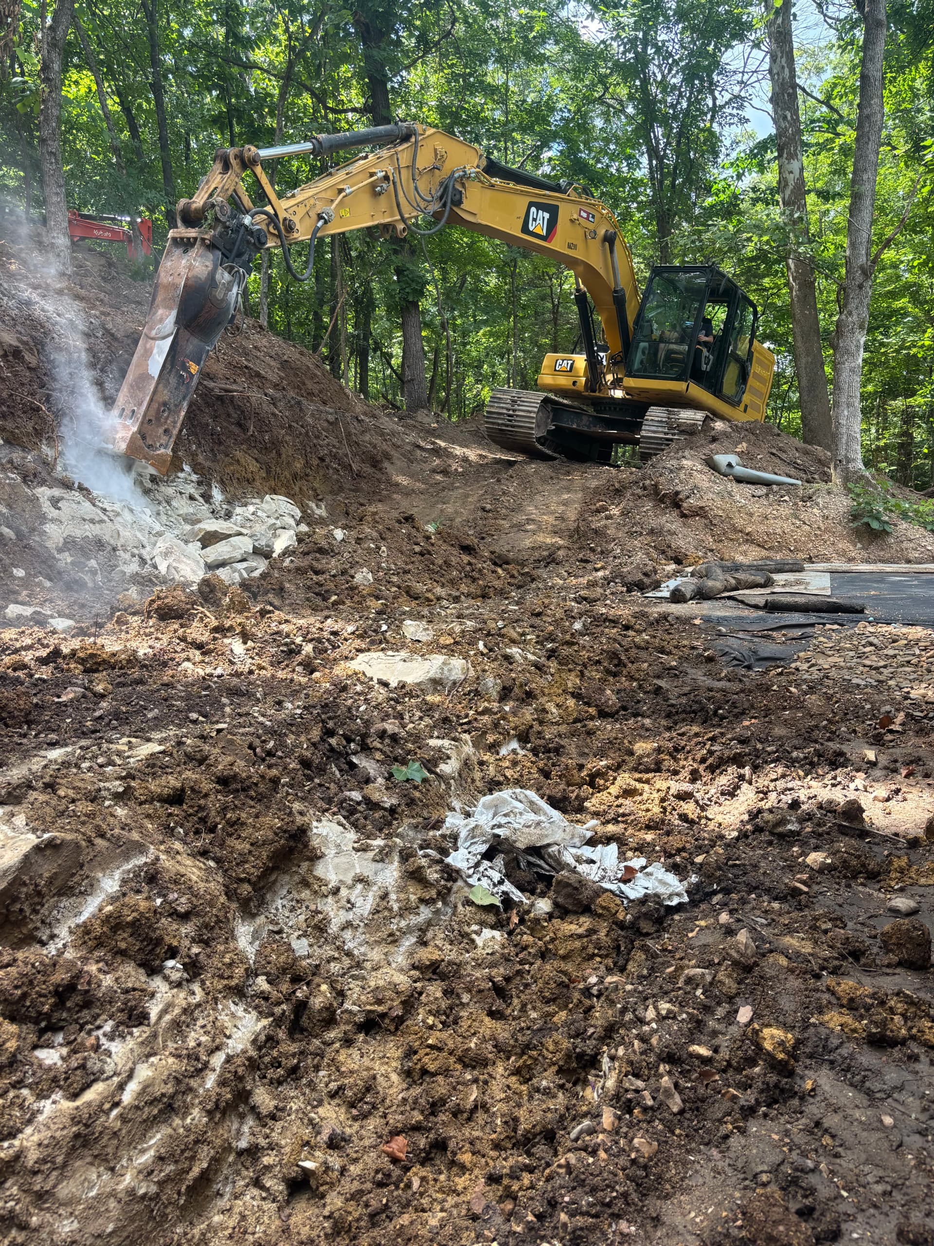 Gallery photos for From Mudslide Risk to Solid Retaining Wall in NWA: Image #3