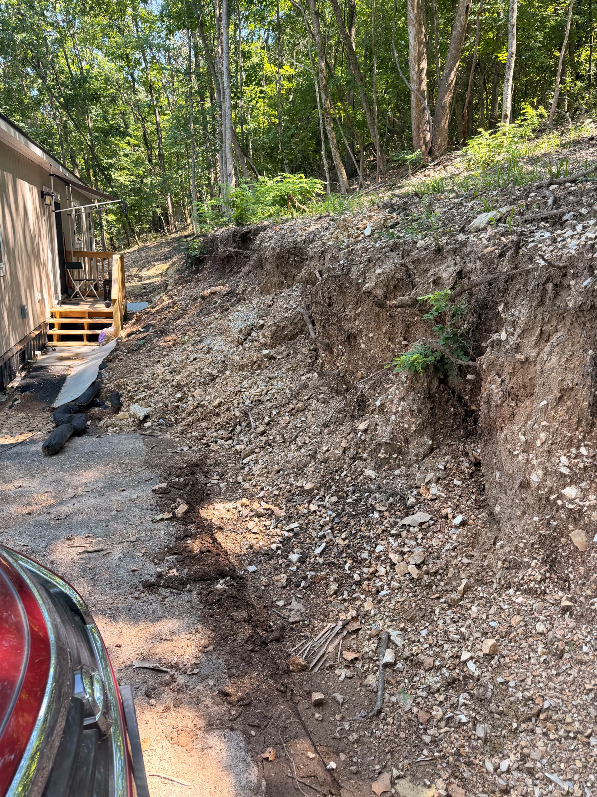 From Mudslide Risk to Solid Retaining Wall in NWA image